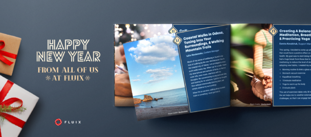 A dark blue gradient background, with sample pages from the Fluix Book of Focus and Wellbeing in the middle of the image, and festively wrapped gift boxes in the bottom corners. Text at the top of image reads: Happy New Year, from all at Fluix.