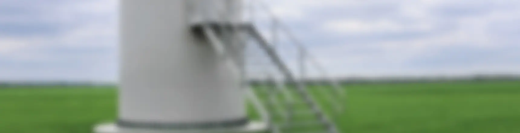 Blurred photo of entrance to the onshore wind turbine tower
