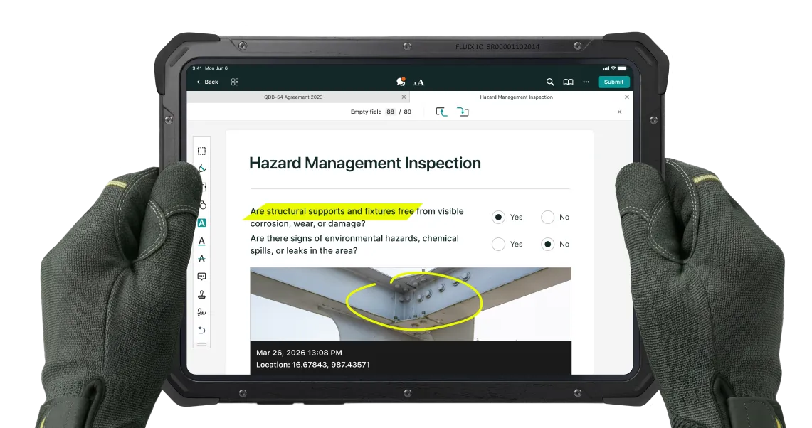 Hazard Management Inspection form with photo evidence and GPS timestamp, completed in the Fluix app.