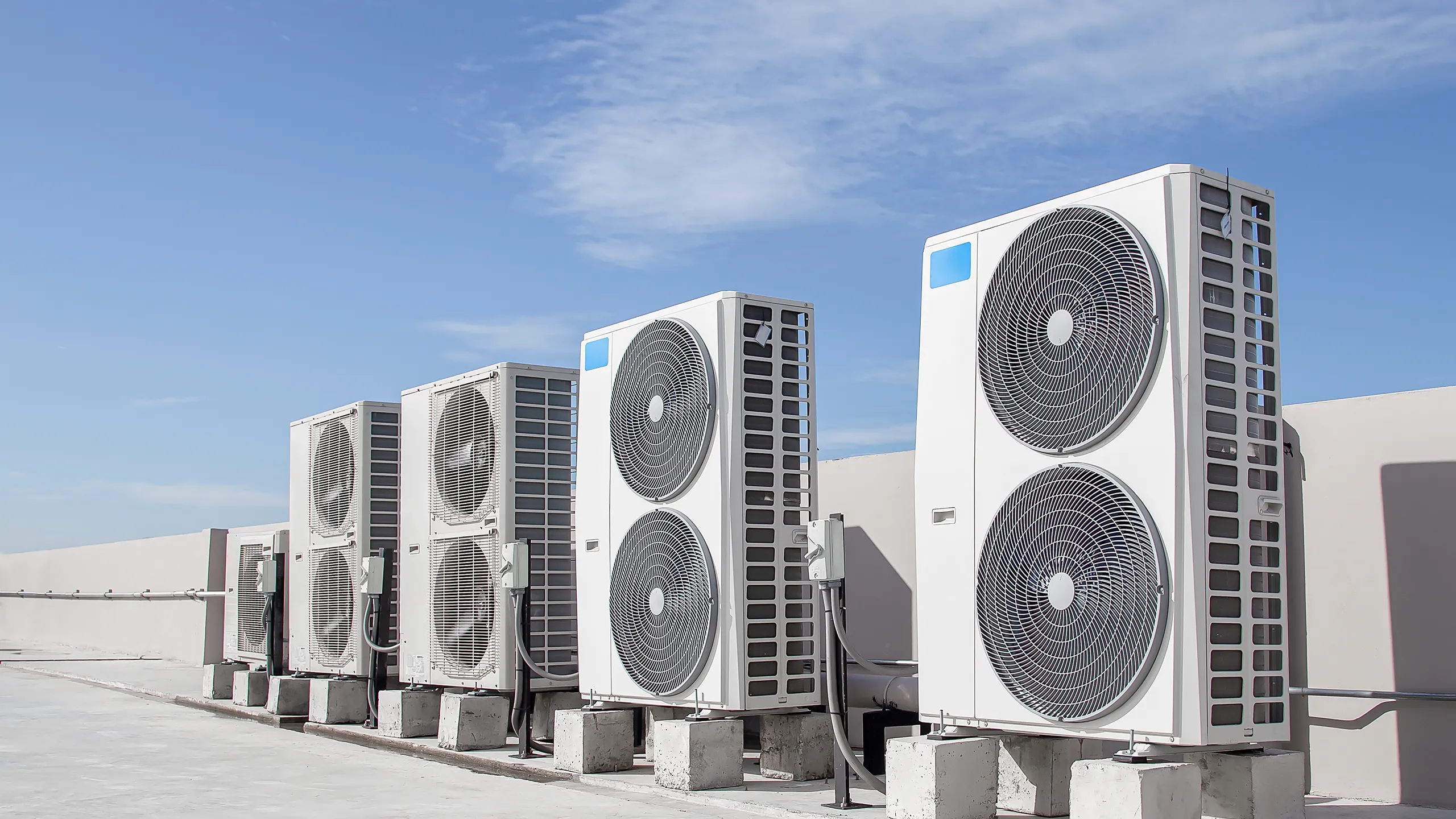 HVAC condenser units installed on a commercial rooftop