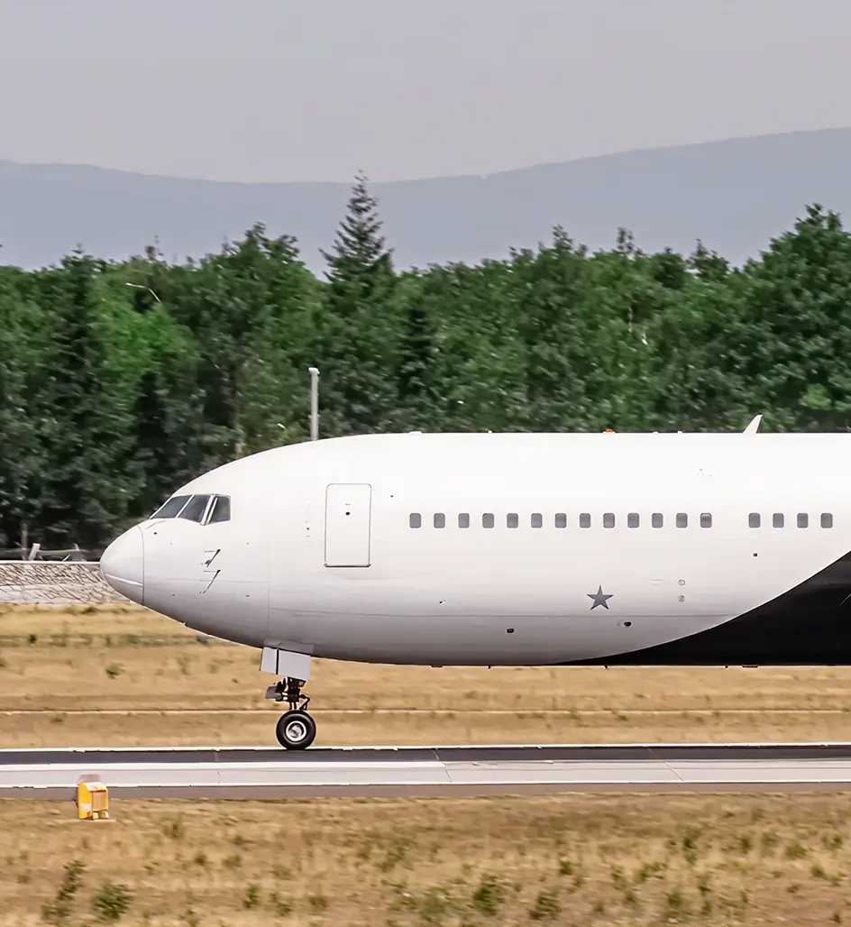 A passenger plane on an airport runway preparing for takeoff is an example of successful aviation operations management