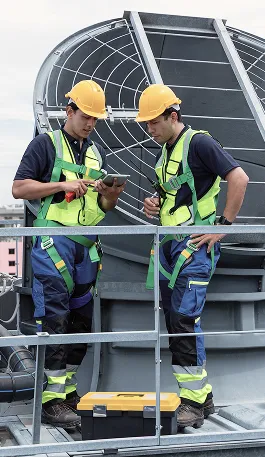 HVAC engineers manage rooftop HVAC units