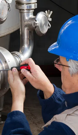 HVAC repairman during maintenance work