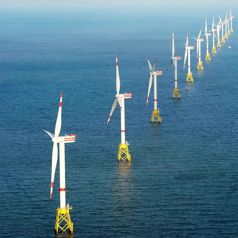 A row of offshore wind turbines
